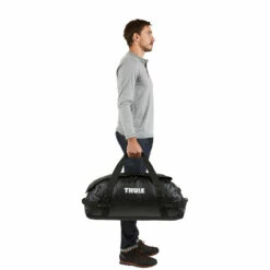 Thule Chasm 70L Duffle Backpack - 69cm 25 Thule Chasm 70L Duffle Backpack - 69cm -Delsey Suitcase Store small thule chasm 70l tdsd203 black fs 02b 3204415 2 97385.1657196109